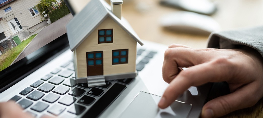 Model House On Laptop