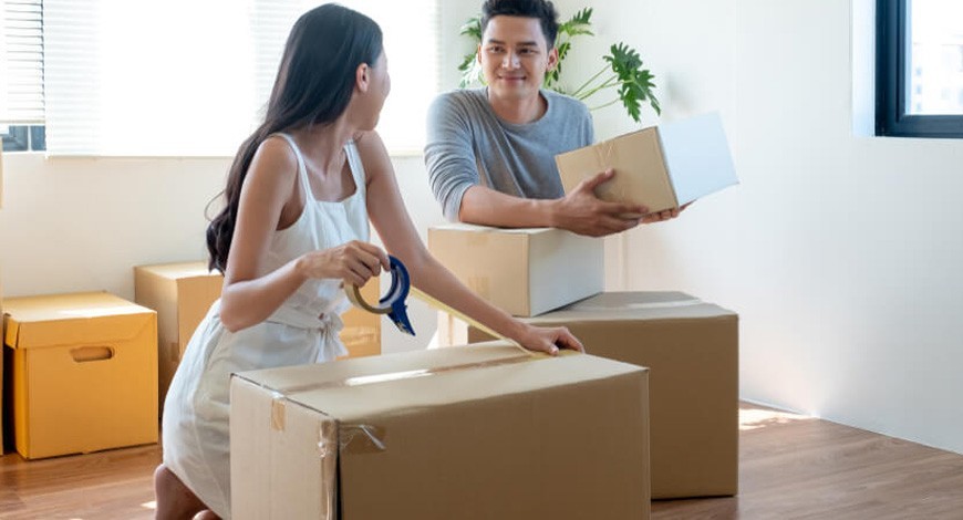 Couple Unpacking Boxes Mobile