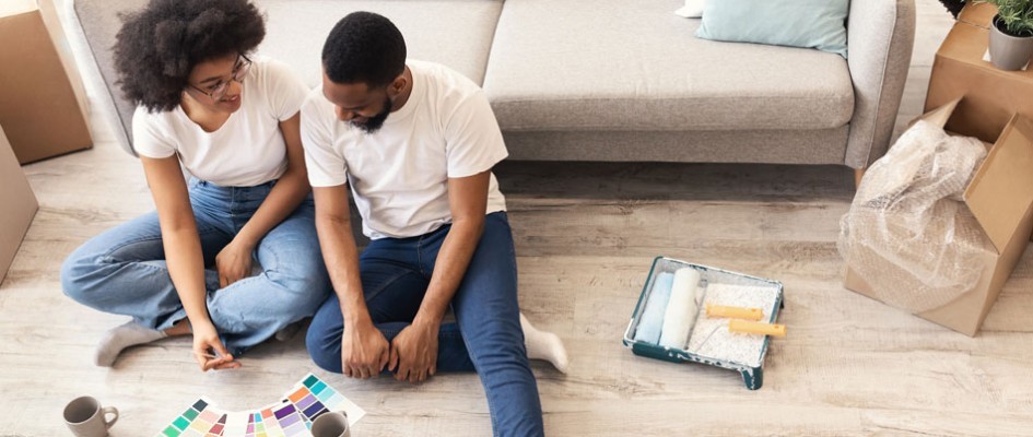 Couple Looking At Paint Charts